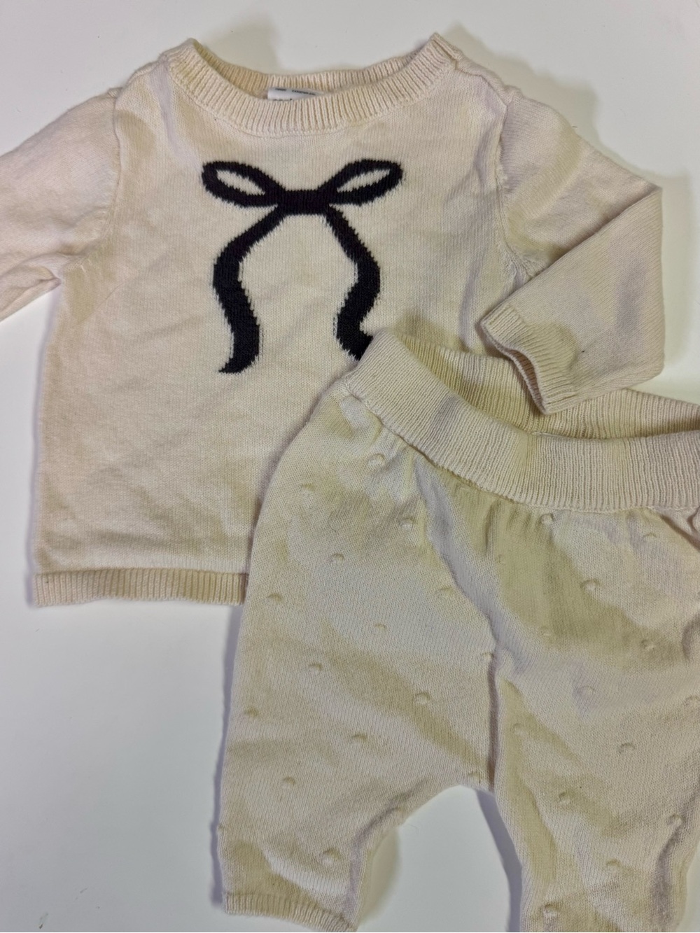 Carter's Cream Knit Newborn Sweater with Black Bow Detail